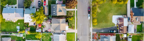 Scenic seasonal landscape from above aerial view of a small town in countryside